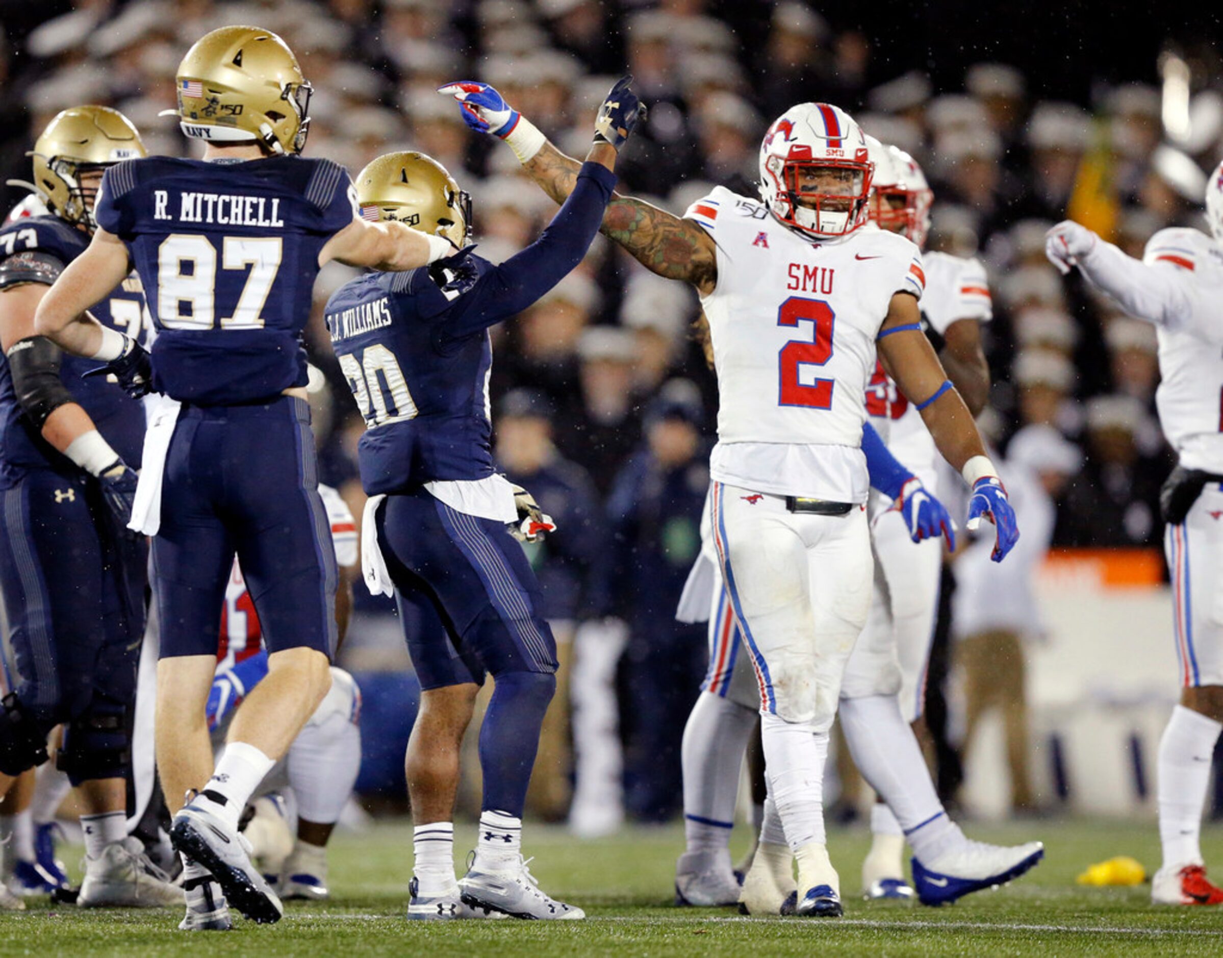 On fourth down late in the fourth quarter, Navy Midshipmen wide receiver Ryan Mitchell (87)...