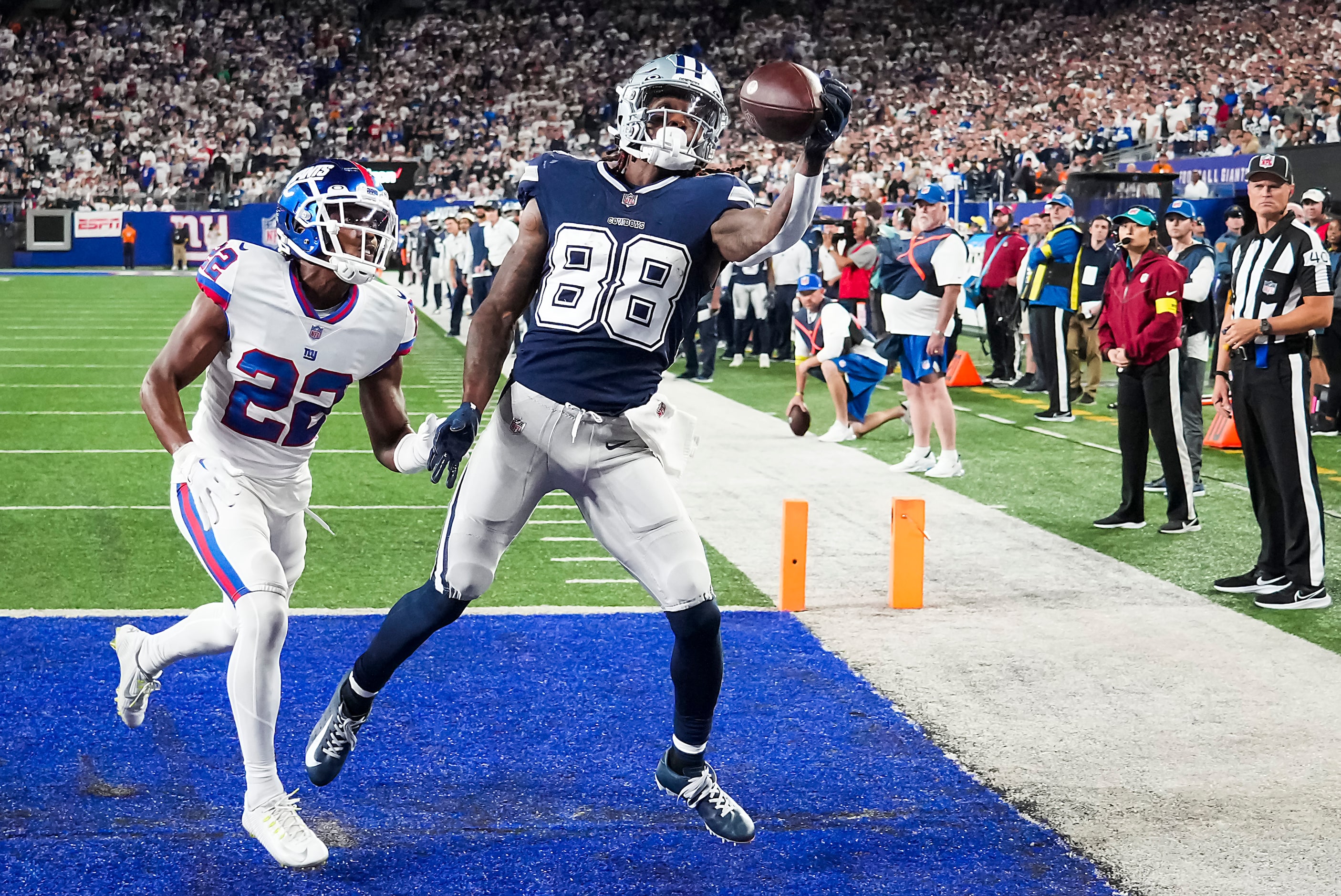 Dallas Cowboys wide receiver CeeDee Lamb (88) makes a one-handed catch for a touchdown  past...