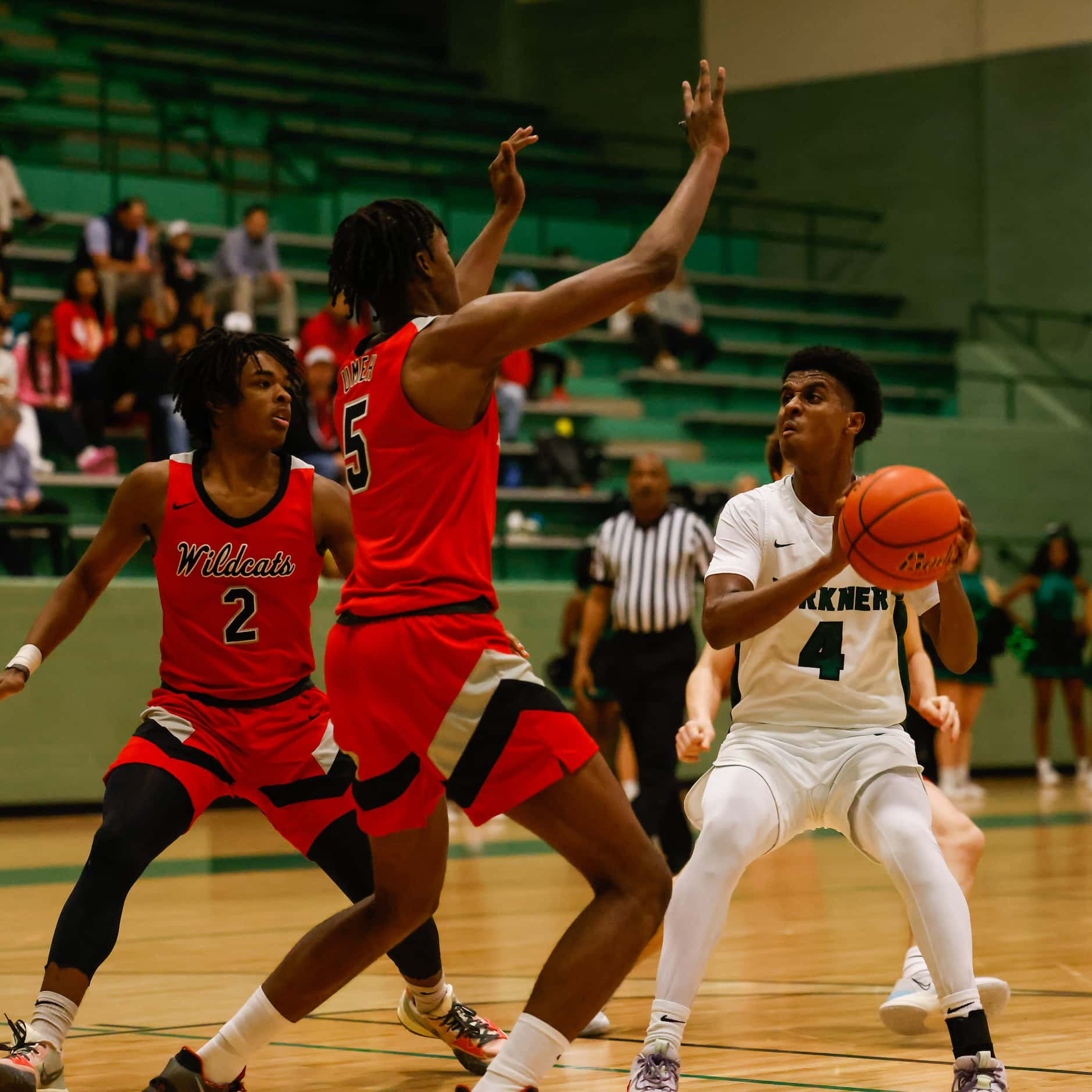 Berkner High School' Adonai Rezene #4 tries to pass a block from Lake Highlands High School'...