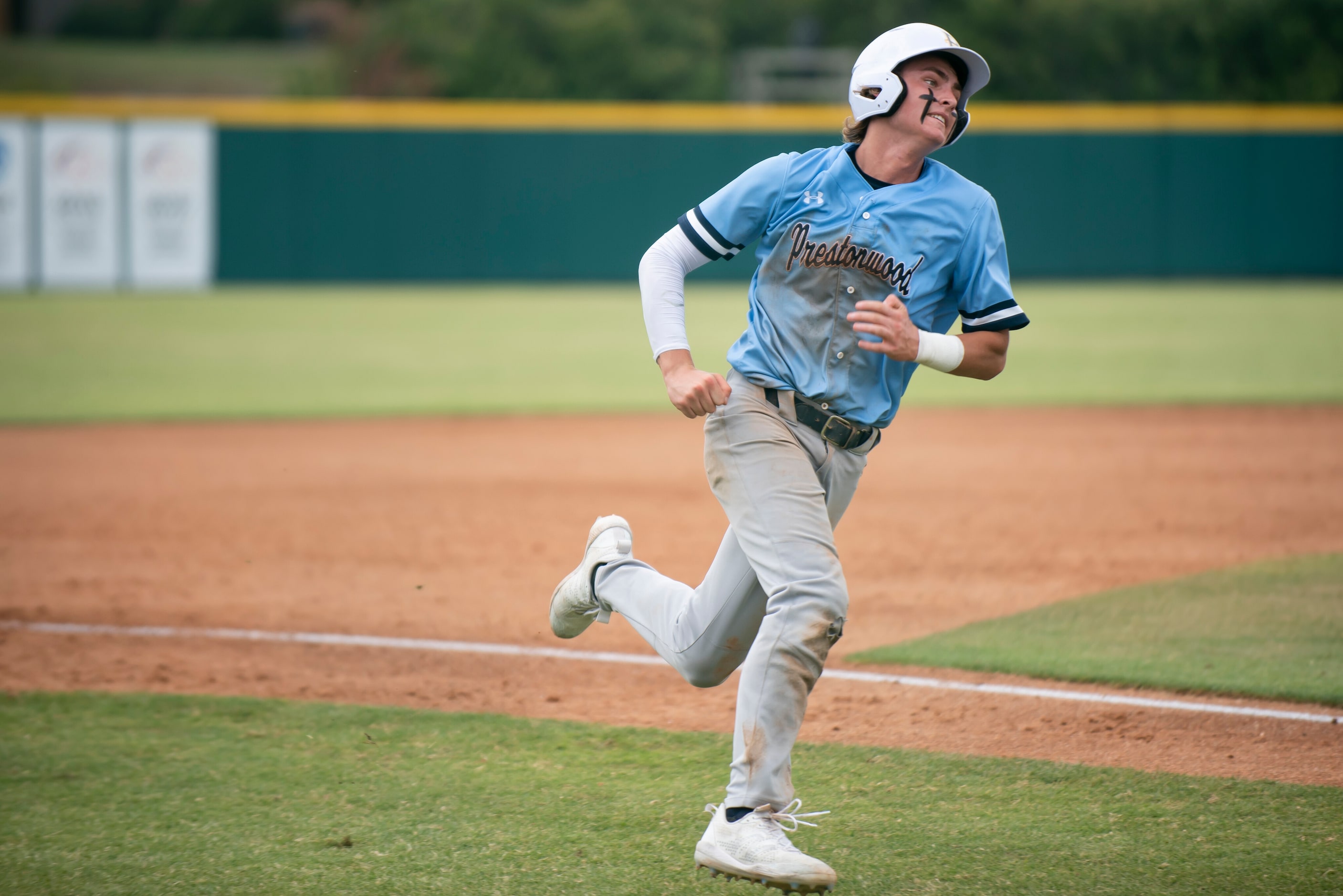 Prestonwood junior Will Johnson (9) sprints around third to score a run during the TAPPS...