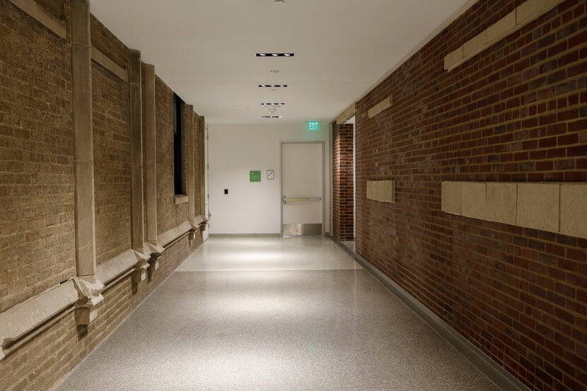 The 1915 and 1955 original outside brick walls of the Dallas County Records Building meet in...