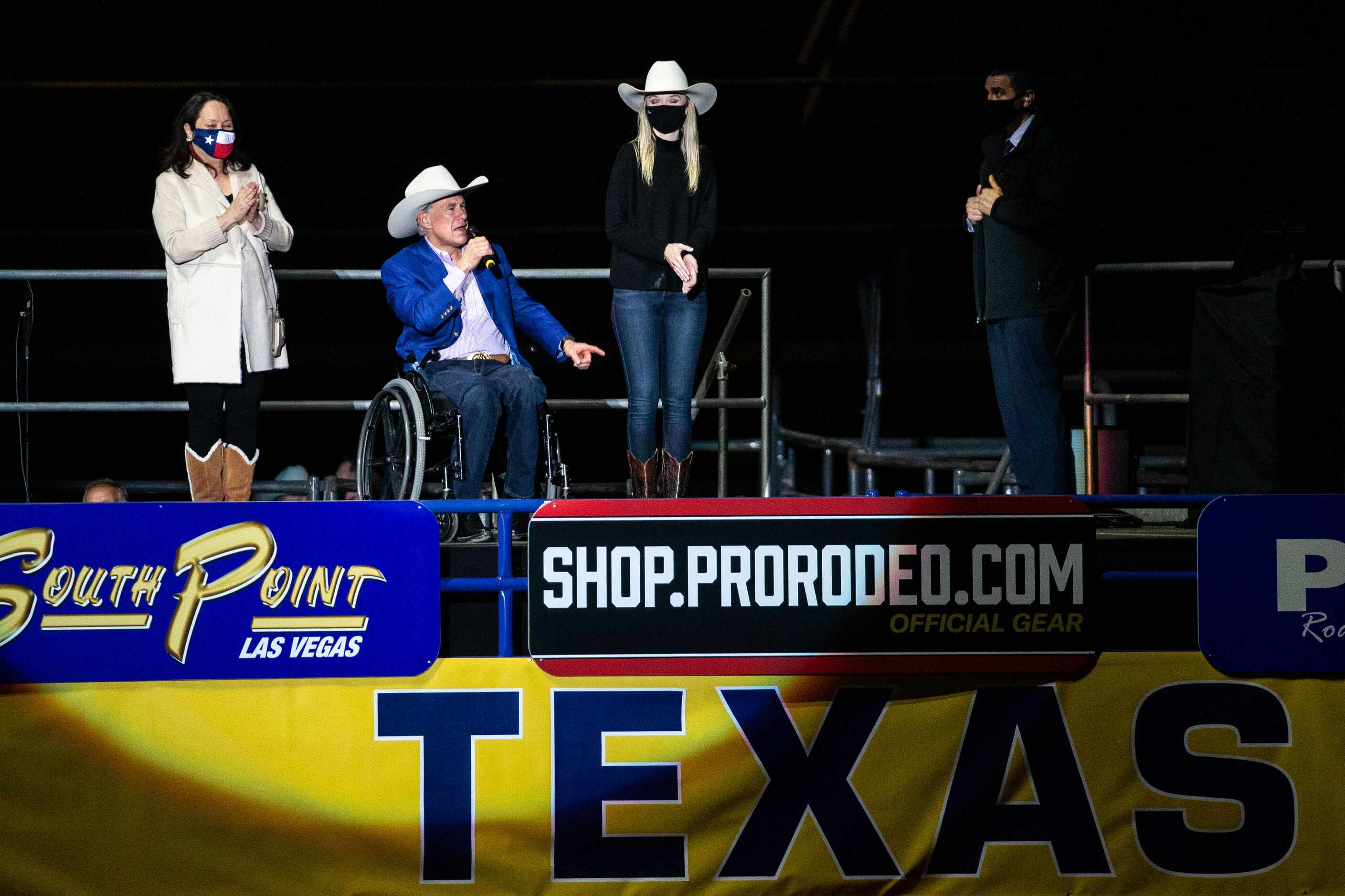 Texas Governor Greg Abbott (center) and First Lady of Texas Cecilia Abbott (left) welcome...