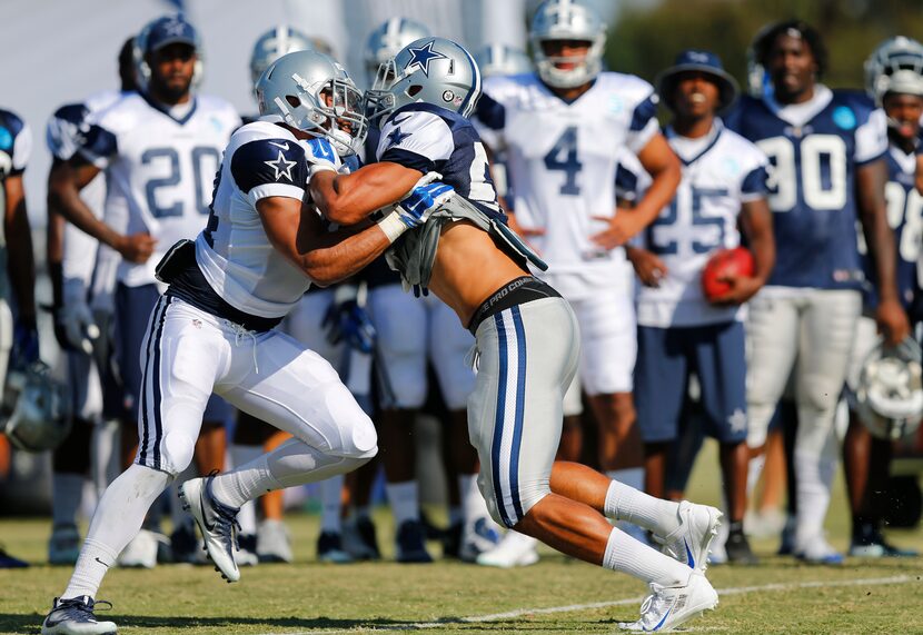 Dallas Cowboys running back Darius Jackson (34) squares off outside linebacker Mark Nzeocha...