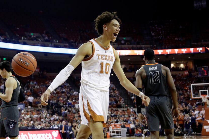 Texas forward Jaxson Hayes (10) celebrates a play during the second half of an NCAA college...