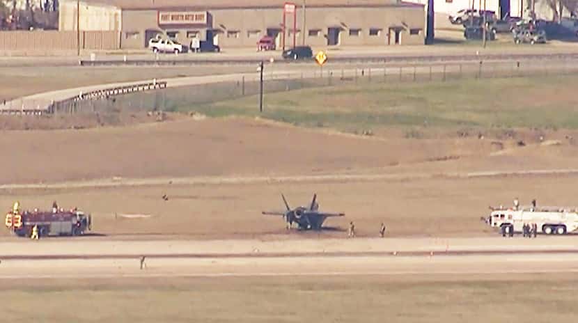 Emergency personnel works at the scene where a pilot ejected from a Lockheed Martin F-35...