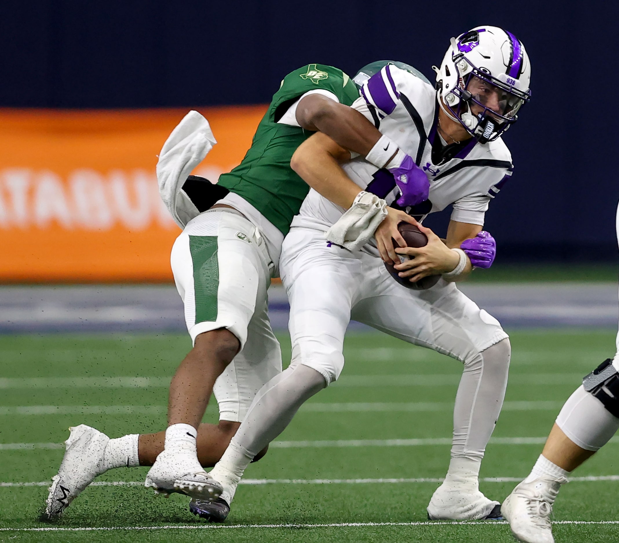 Willis quarterback Jack Emerson (right) is sacked by DeSoto linebacker Jackson Curry during...