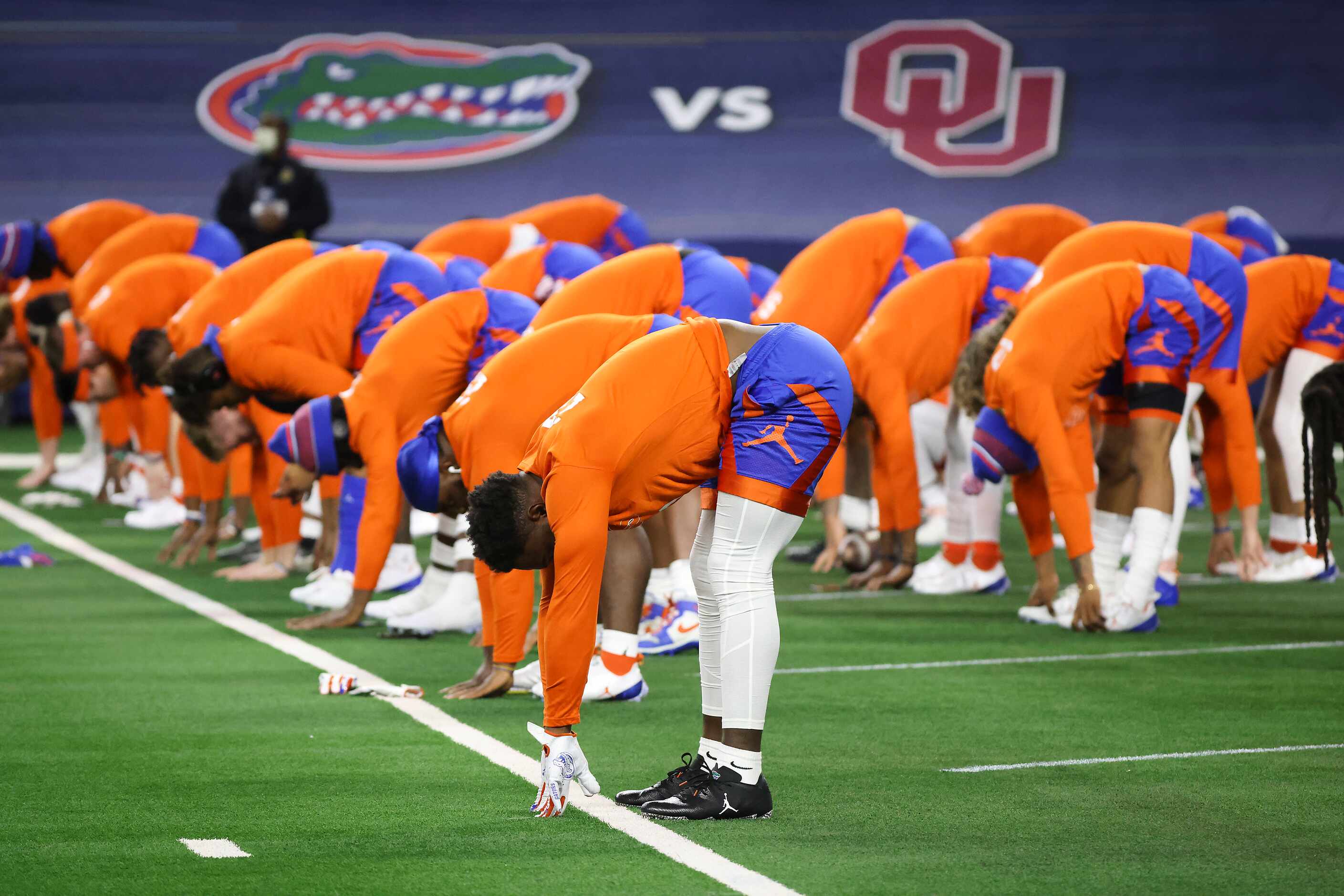 Florida players warm up before the Cotton Bowl Classic against Oklahoma at AT&T Stadium on...