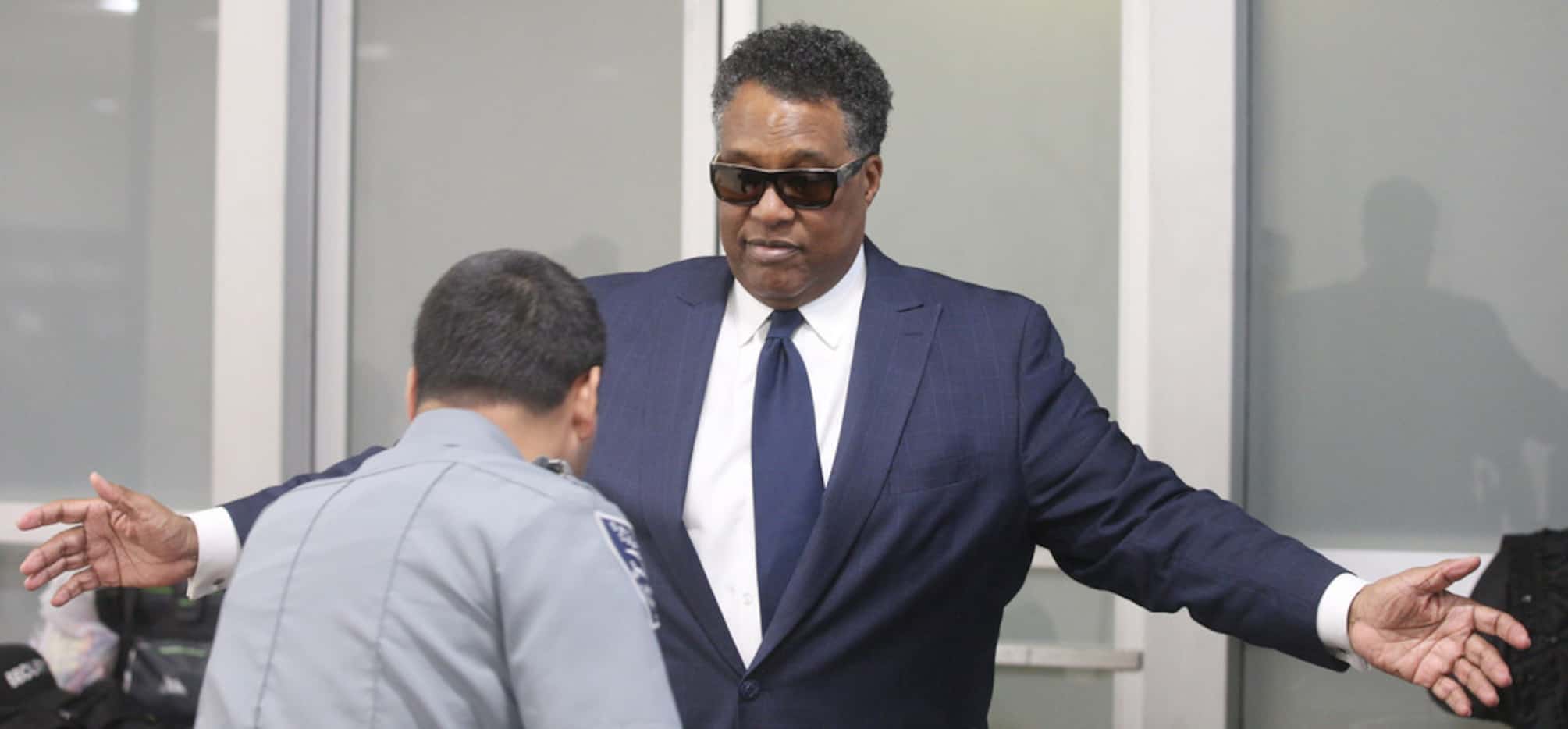 Dwaine Caraway arrives at the Earle Cabell Federal Building for sentencing. Caraway had...
