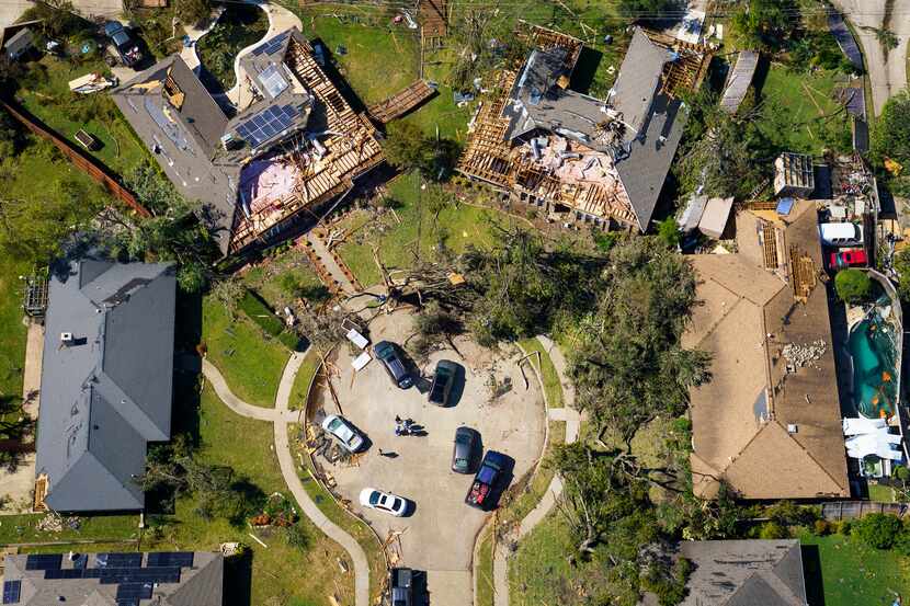 Damaged homes in a cul-de-sac on Stillmeadow Drive in Richardson are seen in aerial view of...