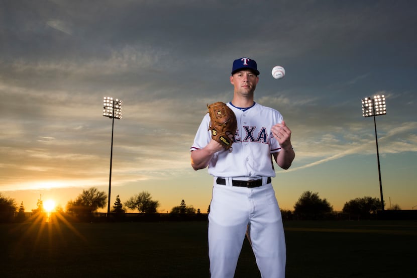 Texas Rangers relief pitcher Andrew Faulkner (56) poses for a portrait on photo day during...