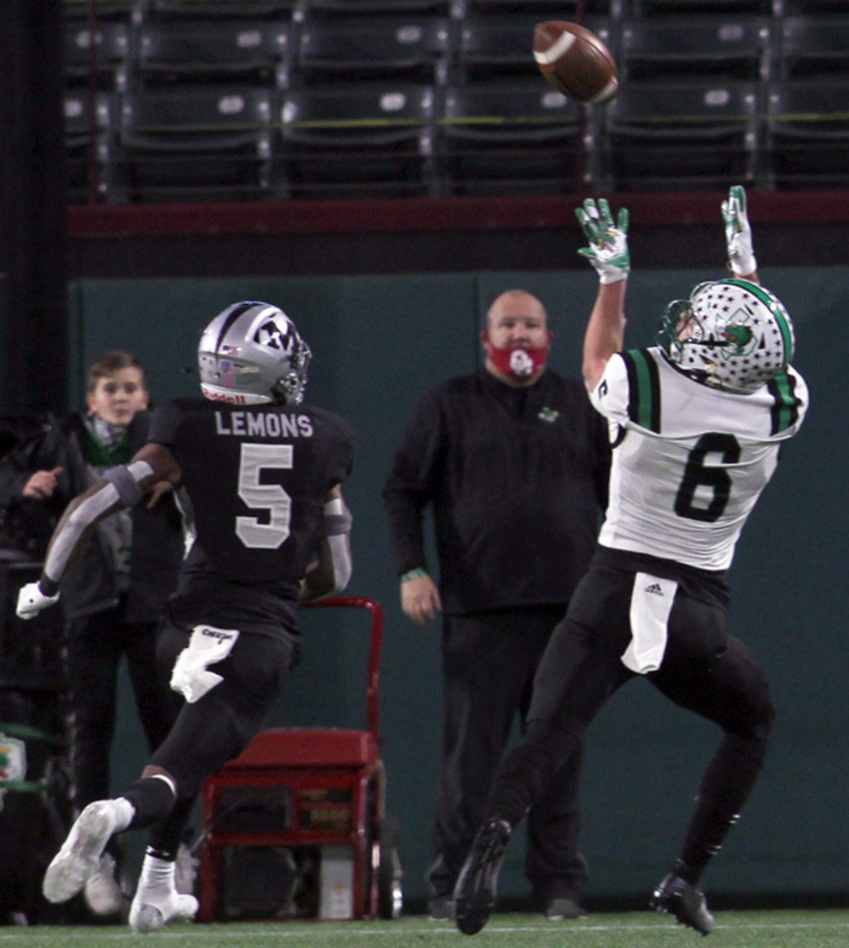 Southlake receiver Landon Samson (6) makes an over-the-shoulder catch for a touchdown as...