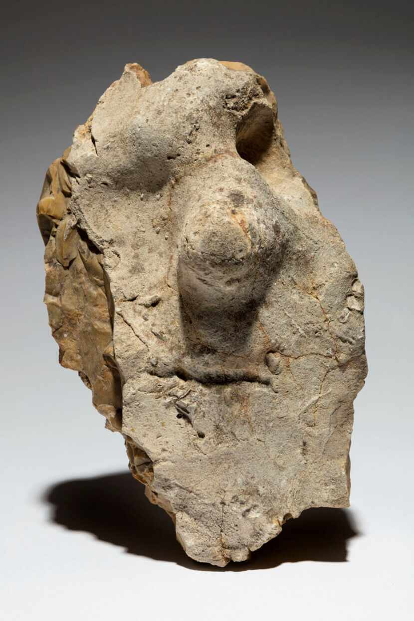 Neanderthal figure stone, Fontmaure, France. 