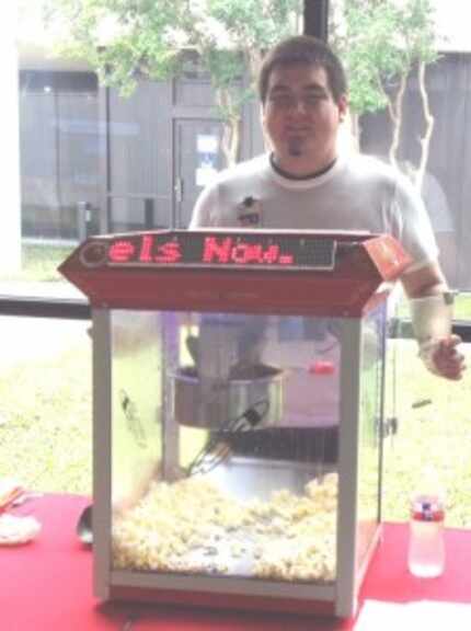  Mark Easley's jazzed-up popcorn machine sends a tweet and displays an LED message when when...