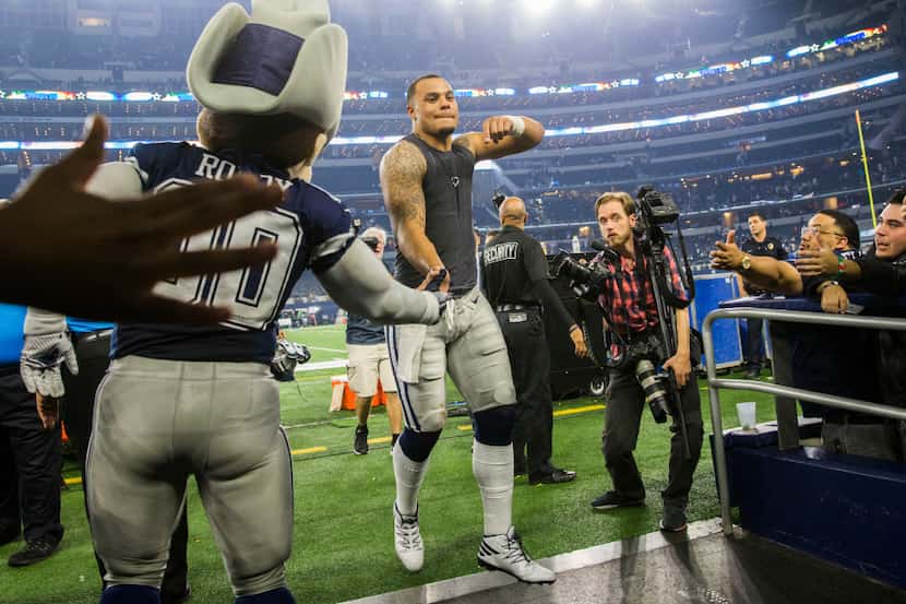 Dallas Cowboys quarterback Dak Prescott (4) leaves the field after their game against the...