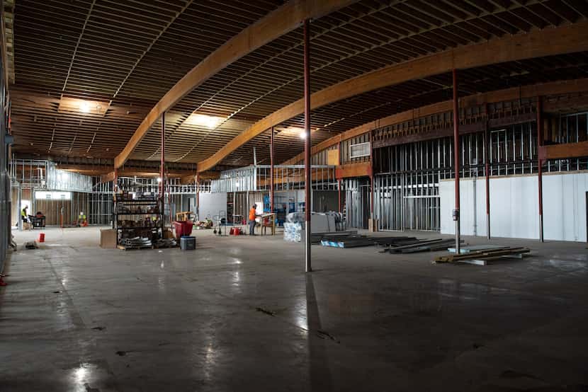 Construction is underway inside the Central Market at the Preston Oaks shopping center on...