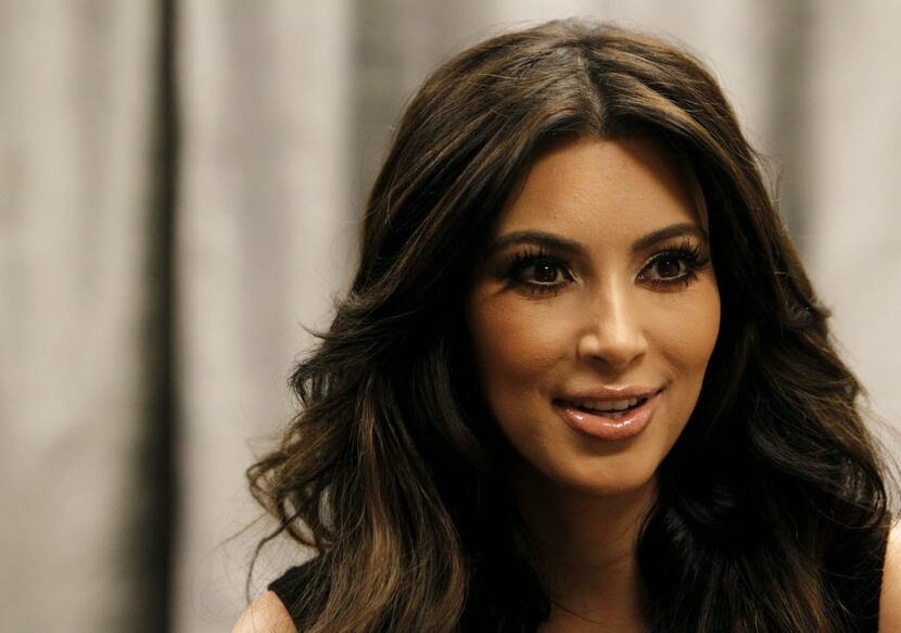 Kim Kardashian answers questions during an interview at Nordstrom Galleria in Dallas, on...