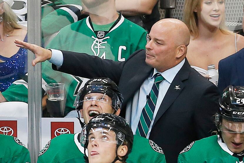 FILE - In this Sept. 18, 2018, file photo, Dallas Stars head coach Jim Montgomery directs...