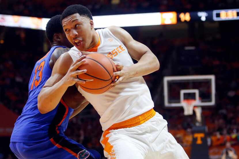 FILE - In this Feb. 21, 2018 file photo, Tennessee forward Grant Williams (2) drives the...