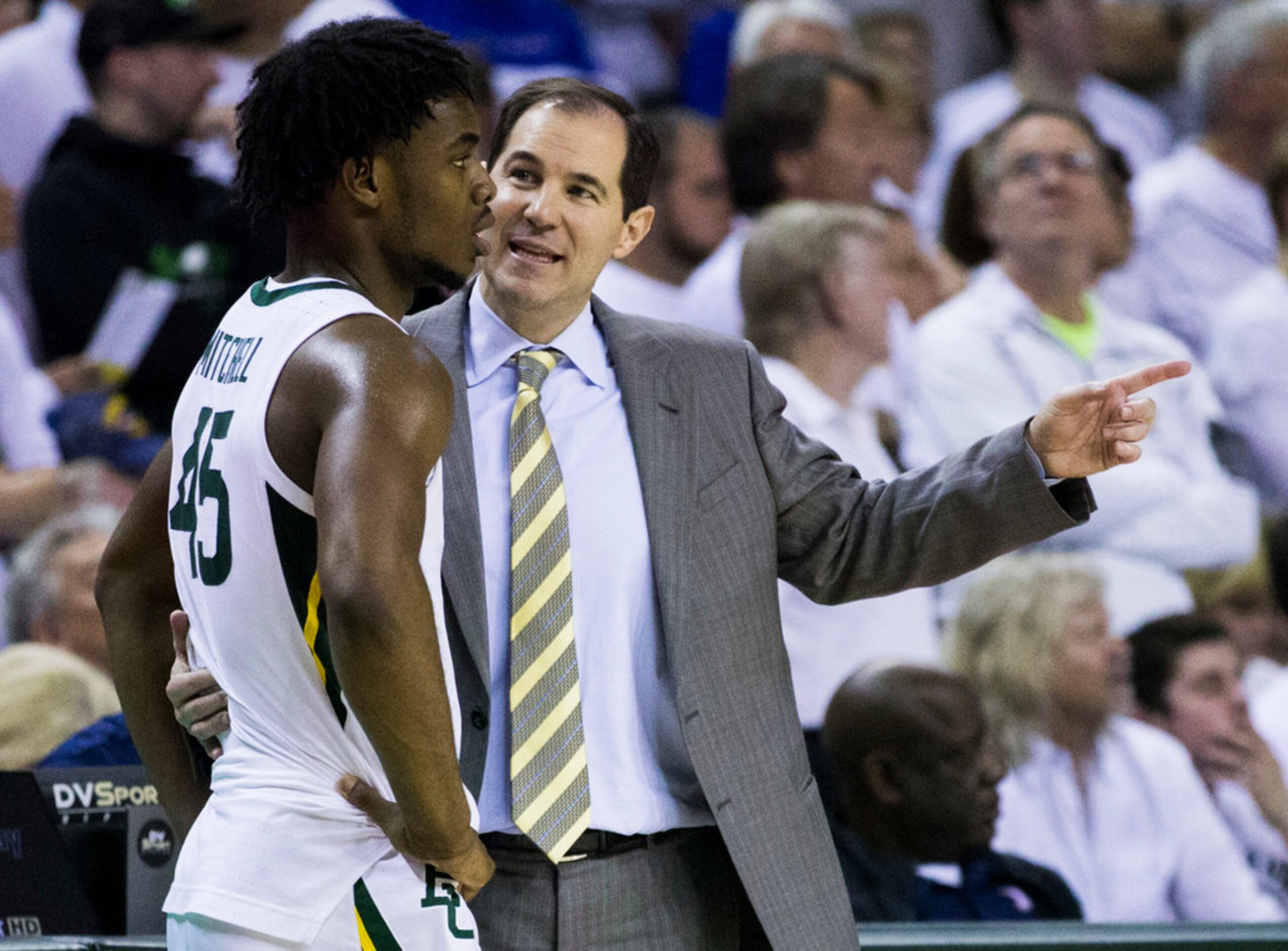 Baylor Bears guard Davion Mitchell (45) talks with head coach Scott Drew during the second...