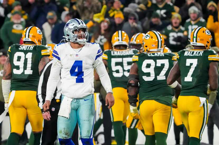 Dallas Cowboys quarterback Dak Prescott (4) heads to the sidelines after turning the ball...