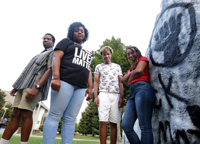 Chizuruoke Ukachi-Nwata, left, Jasmine Cook, Isaiah Francis, and Axum Taylor pose near the...