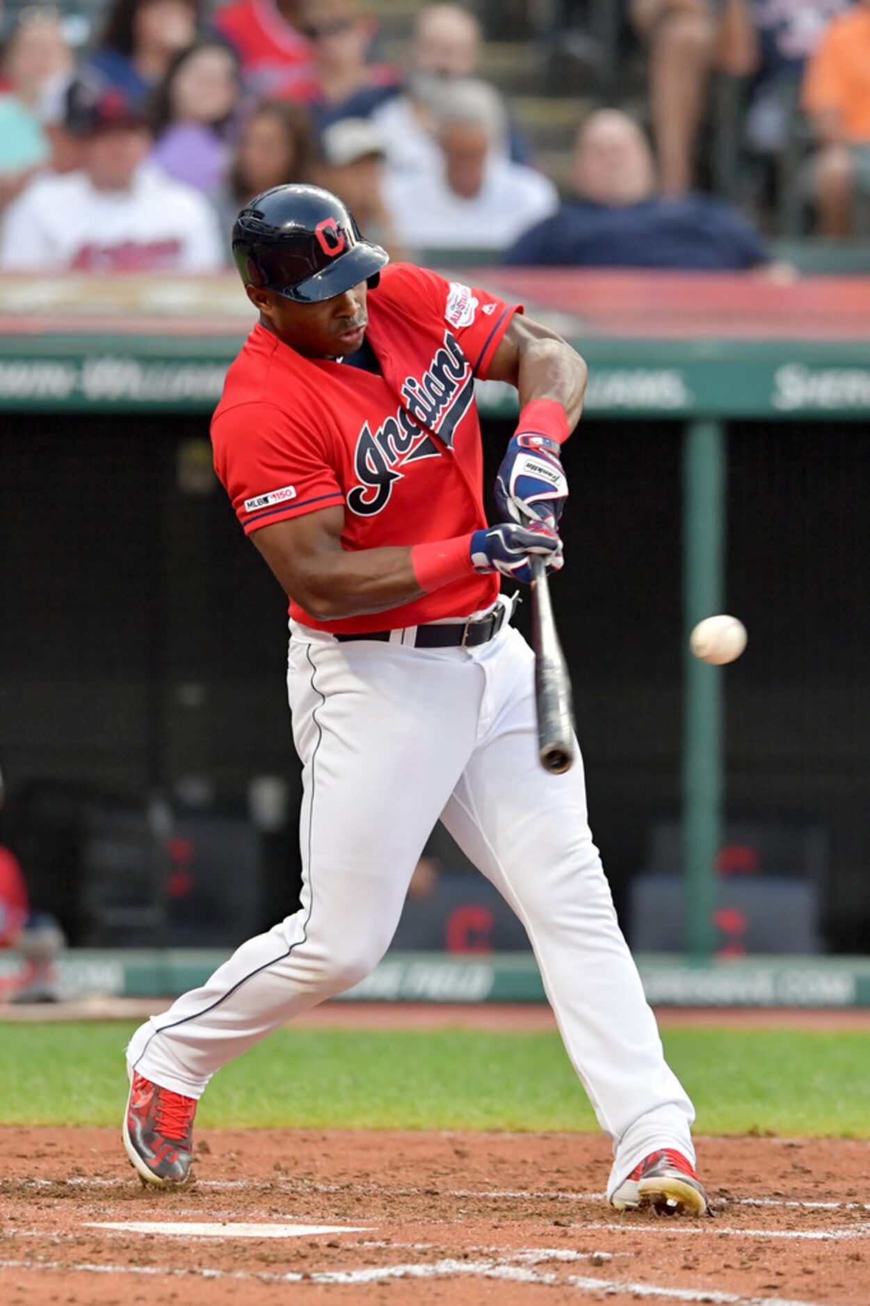 CLEVELAND, OHIO - AUGUST 05: Yasiel Puig #66 of the Cleveland Indians hits a single during...