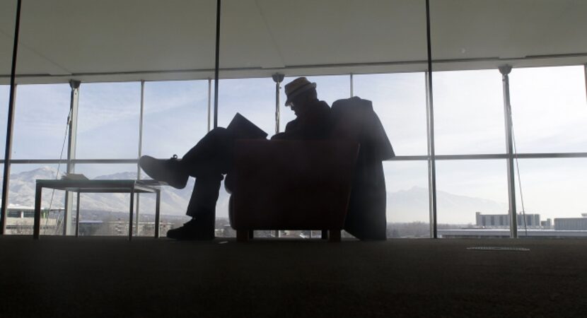 A man reads at the Salt Lake City Library Wednesday, Jan. 9, 2013, in Salt Lake City. Making...