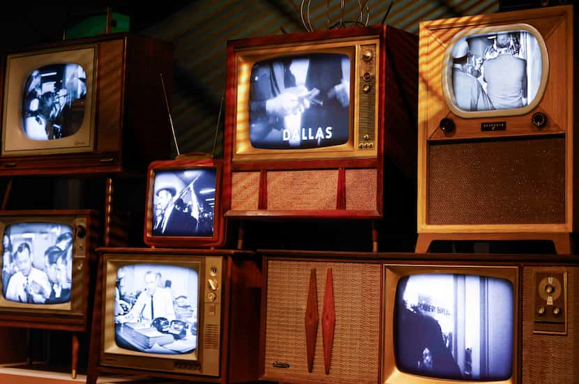Old television sets show footage related to the JFK assassination at a new exhibition at the...
