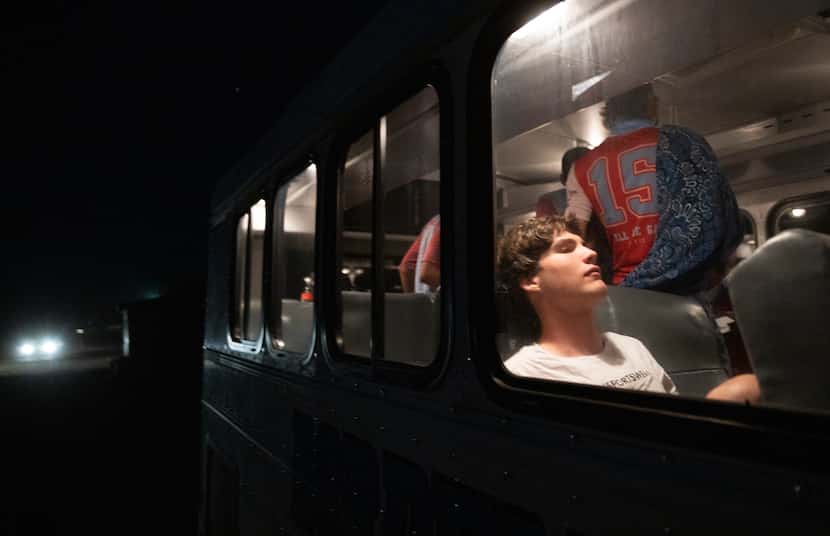 Borden County High School football players board the bus after winning their first season...