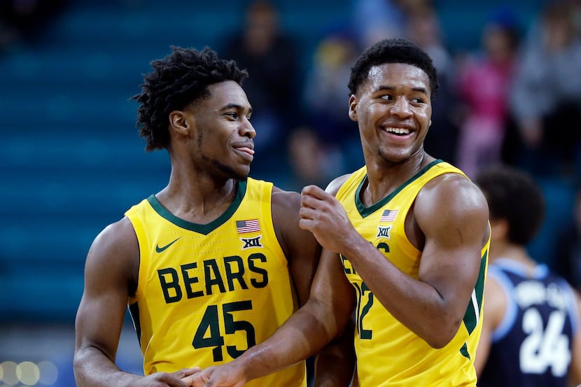 FILE - In this Sunday, Nov. 24, 2019 file photo, Baylor guard Davion Mitchell (45) and guard...