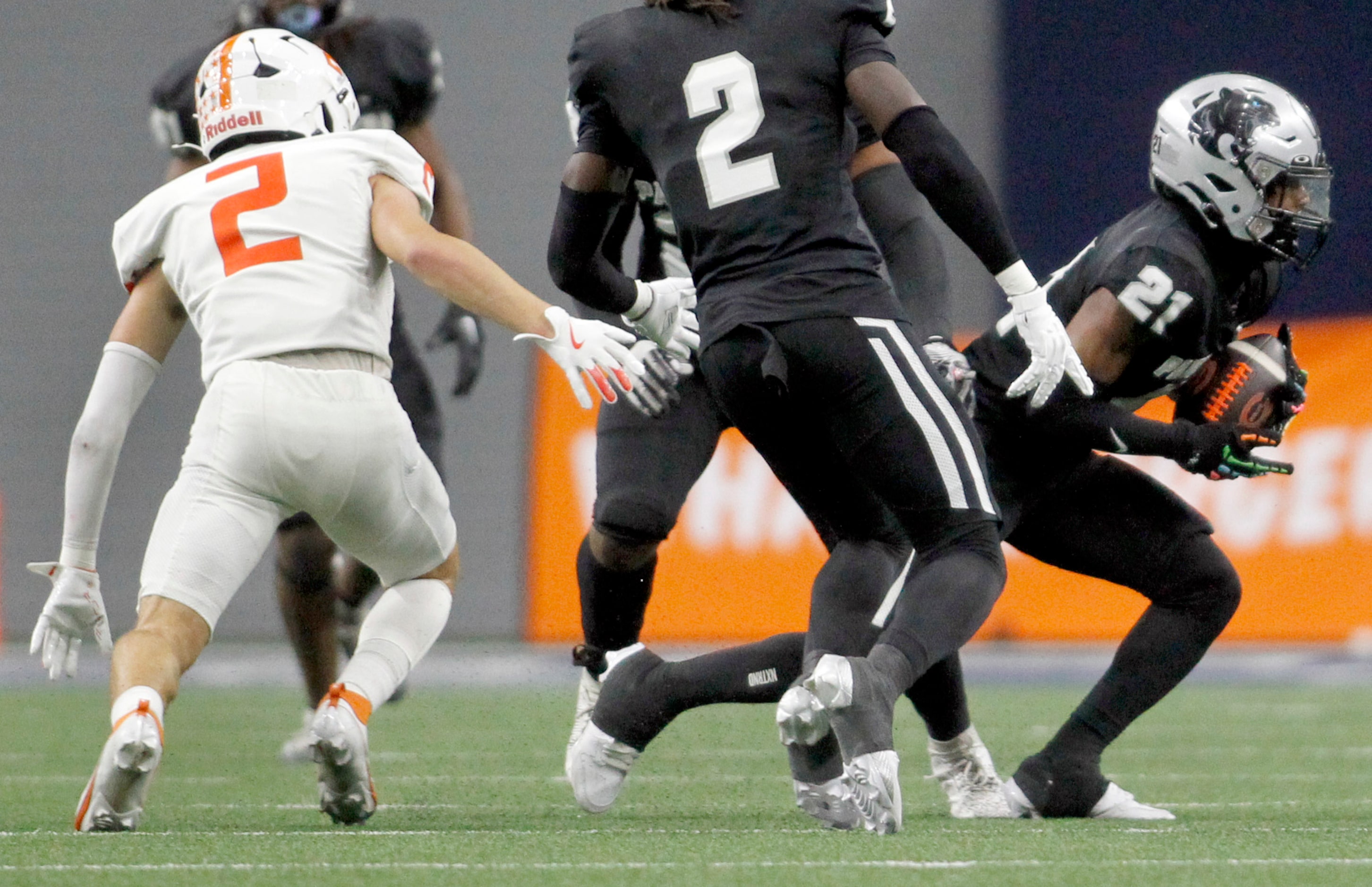 Frisco Panther Creek defensive back Caden Green (21), right, comes up with an interception...