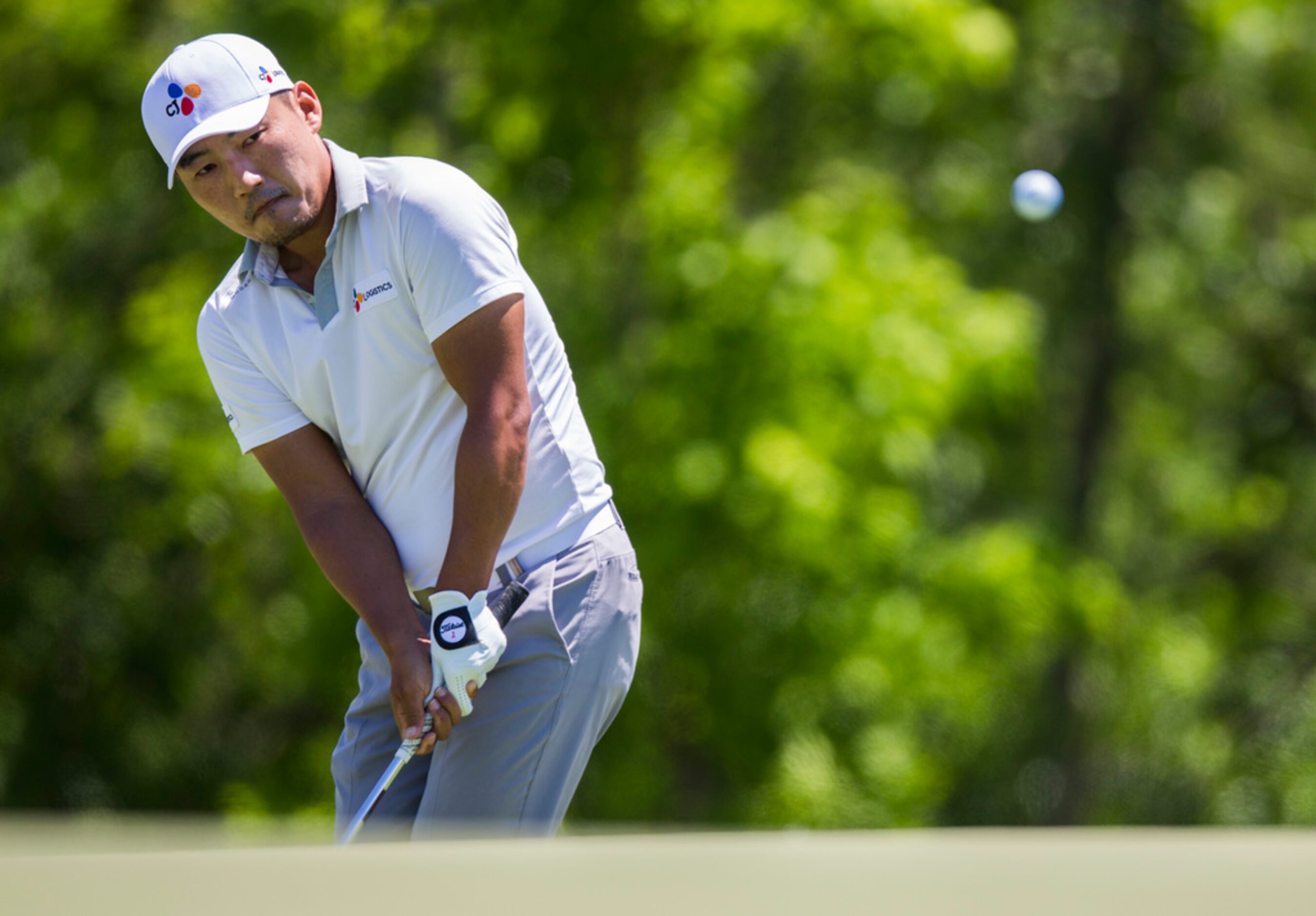 Sung Kang takes a shot on hole 4 during round 4 of the AT&T Byron Nelson golf tournament on...