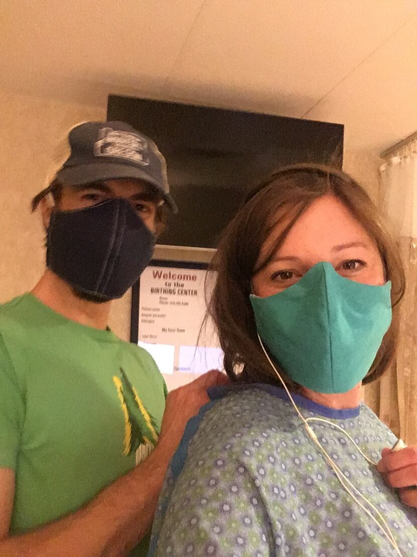Caitlin Wells Salerno was in good enough shape during labor to snap this selfie with husband...