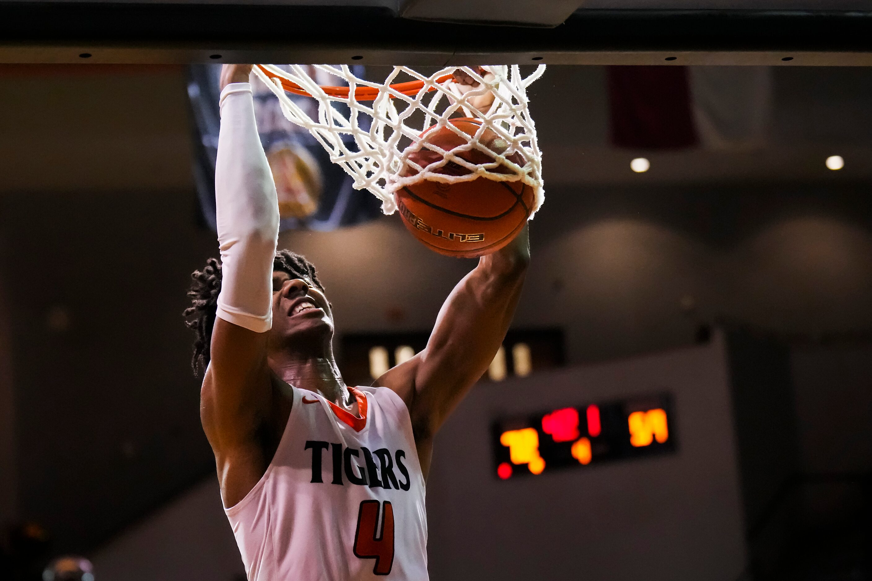 Lancaster's Dillon Battie dunks the ball during a boys high school basketball game against...