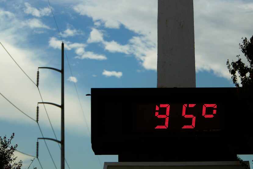 The outdoor sign at the Inwood National Bank in Duncanville showed a sub-100 degree...