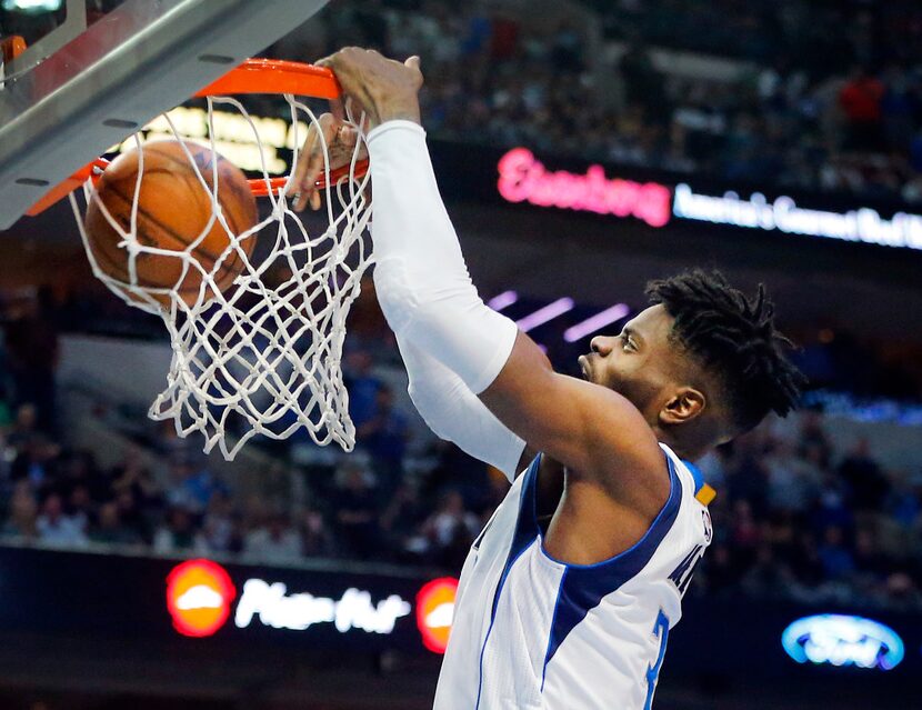 Dallas Mavericks forward Nerlens Noel (3) slams the ball through the hoop against the Los...