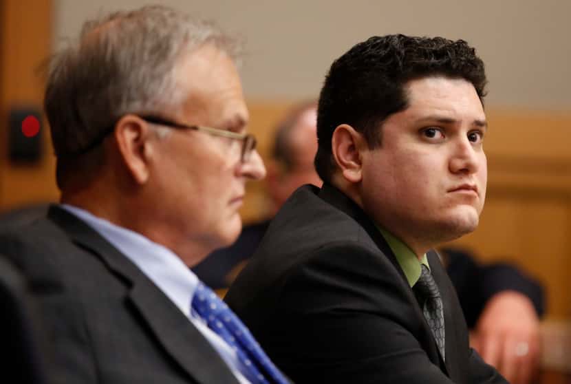 Enrique Arochi (right) sat with defense attorney Steven Miears during his trial in McKinney...