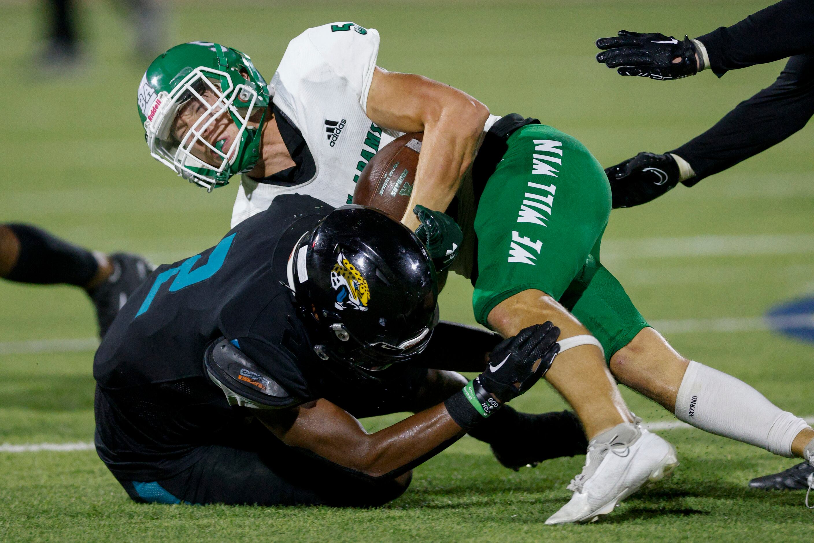 Molina defensive back Mikavion Jones (2) tackles Bryan Adams running back Blake Swain (5)...