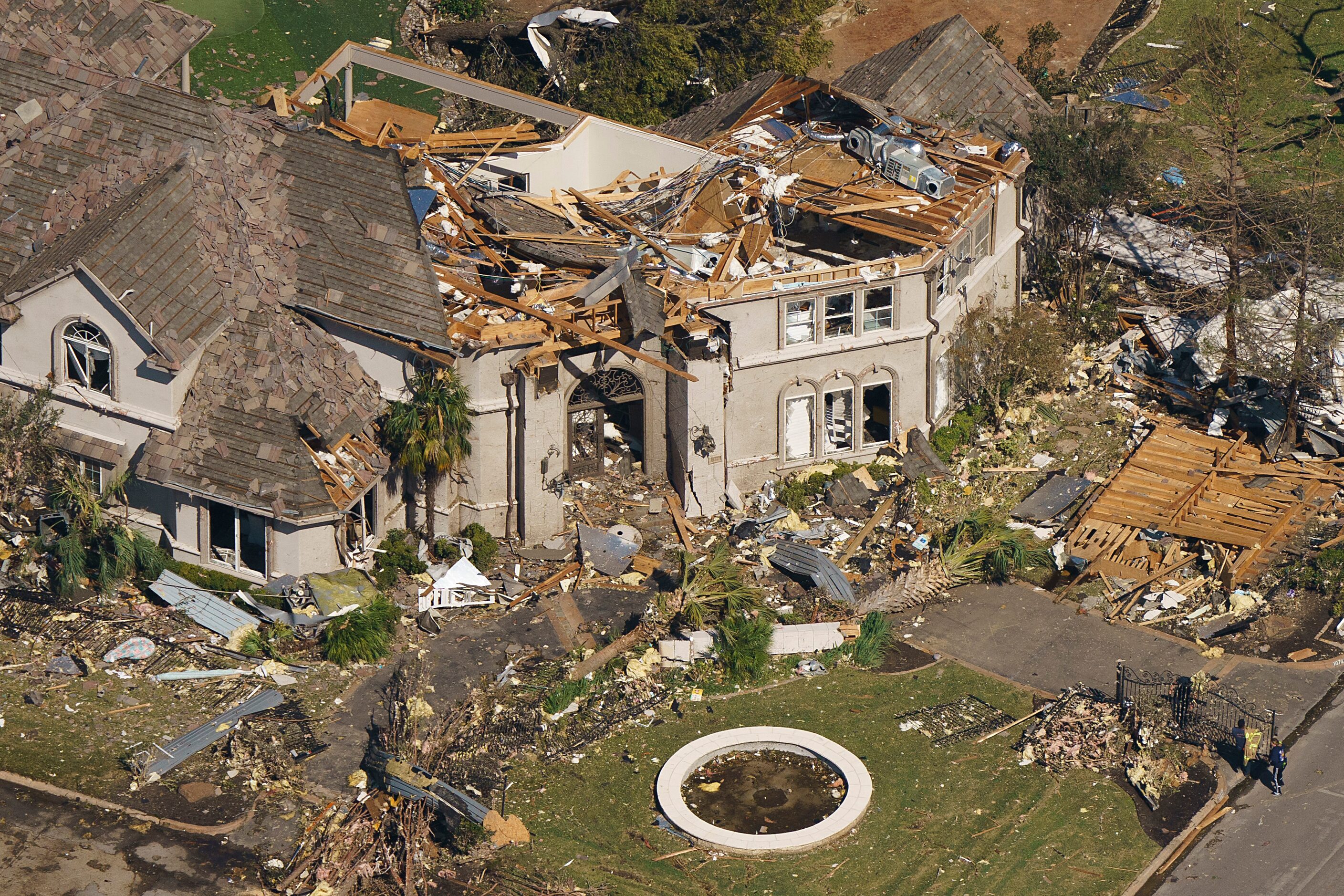 Debris is strewn around a house owned by Dallas Stars NHL hockey player Tyler Seguin after a...