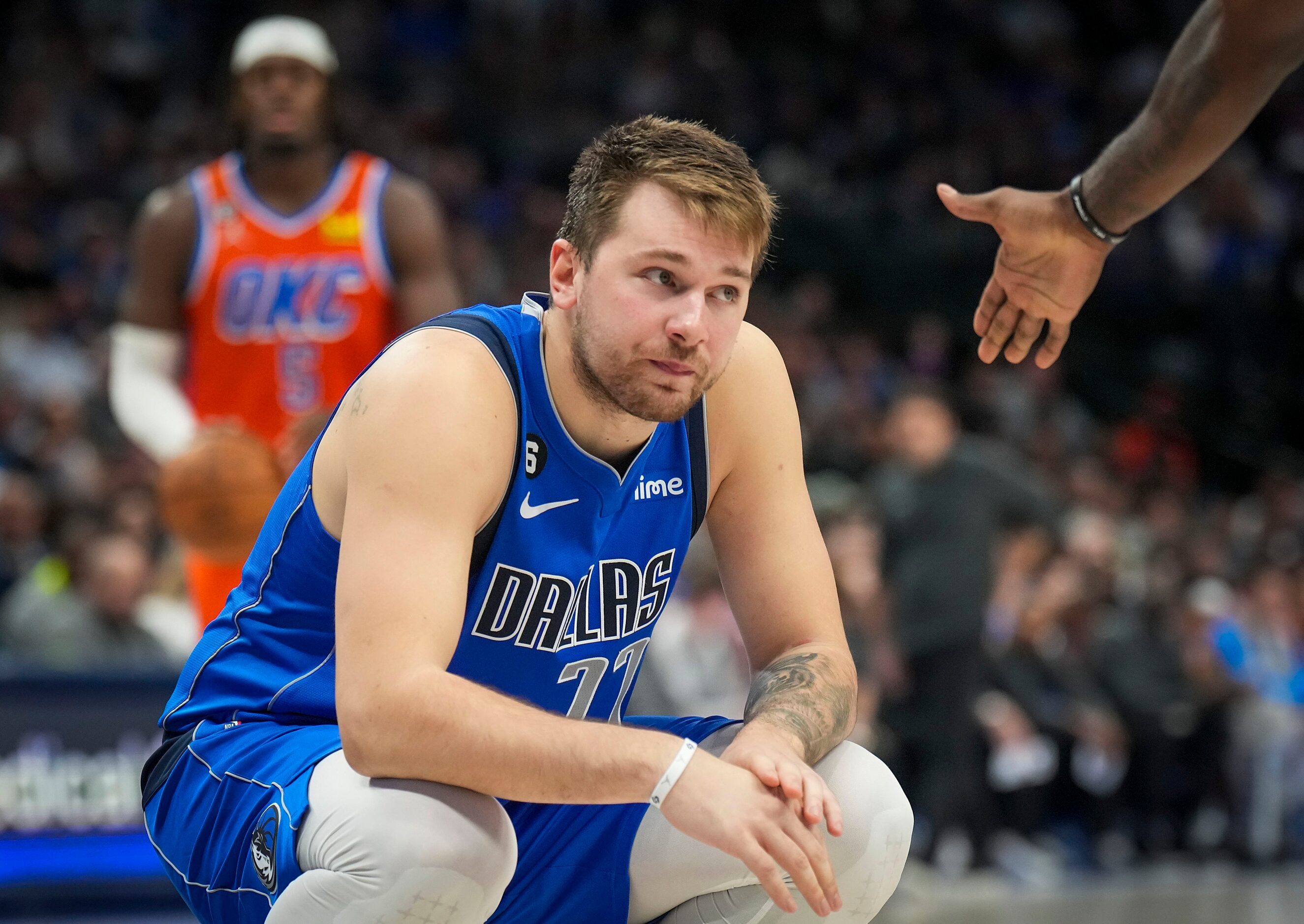 Dallas Mavericks guard Luka Doncic reacts after a basket by the Oklahoma City Thunder during...