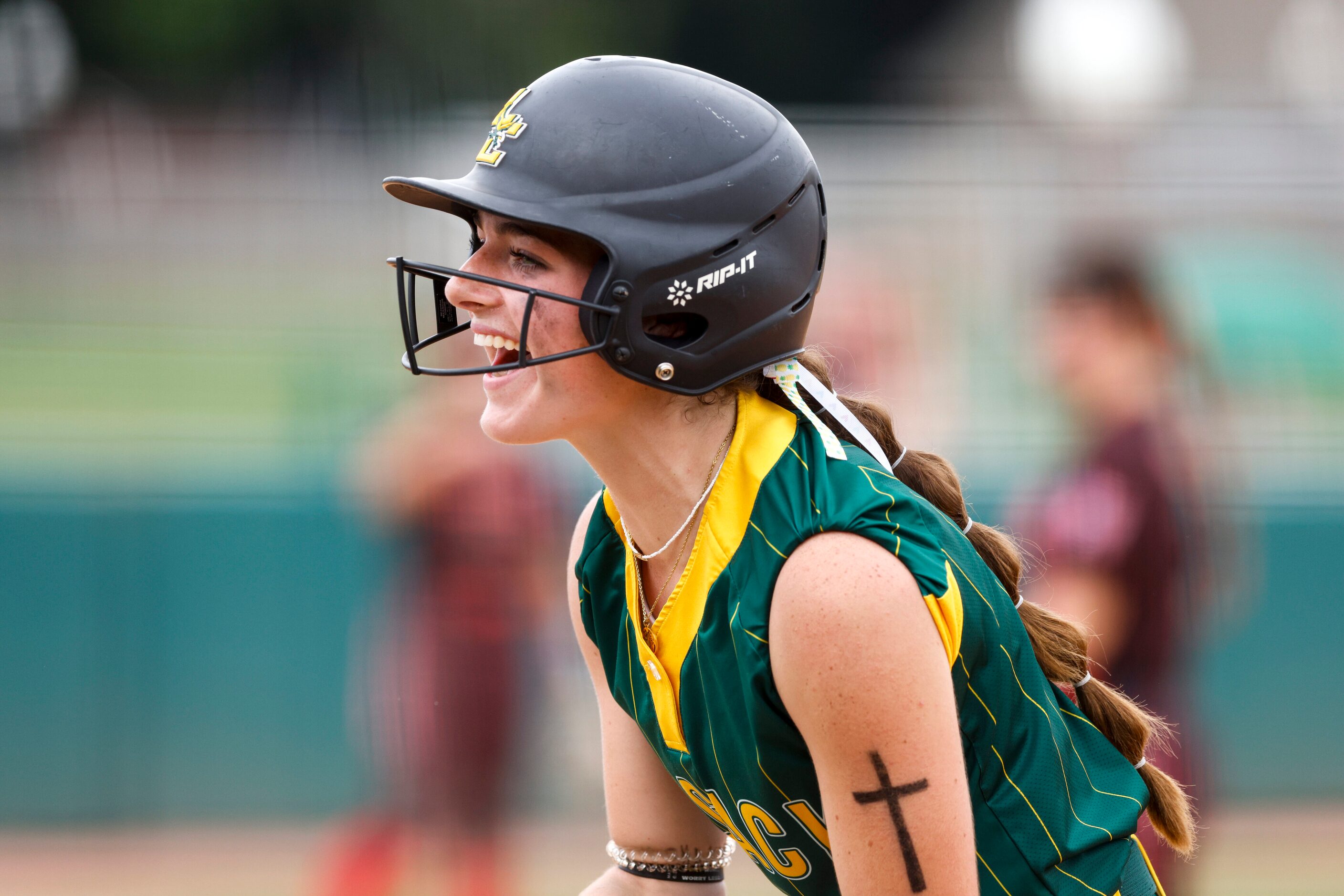 Frisco Legacy Christian outfielder Alexandra Thomas (5) screams as she celebrates a single...