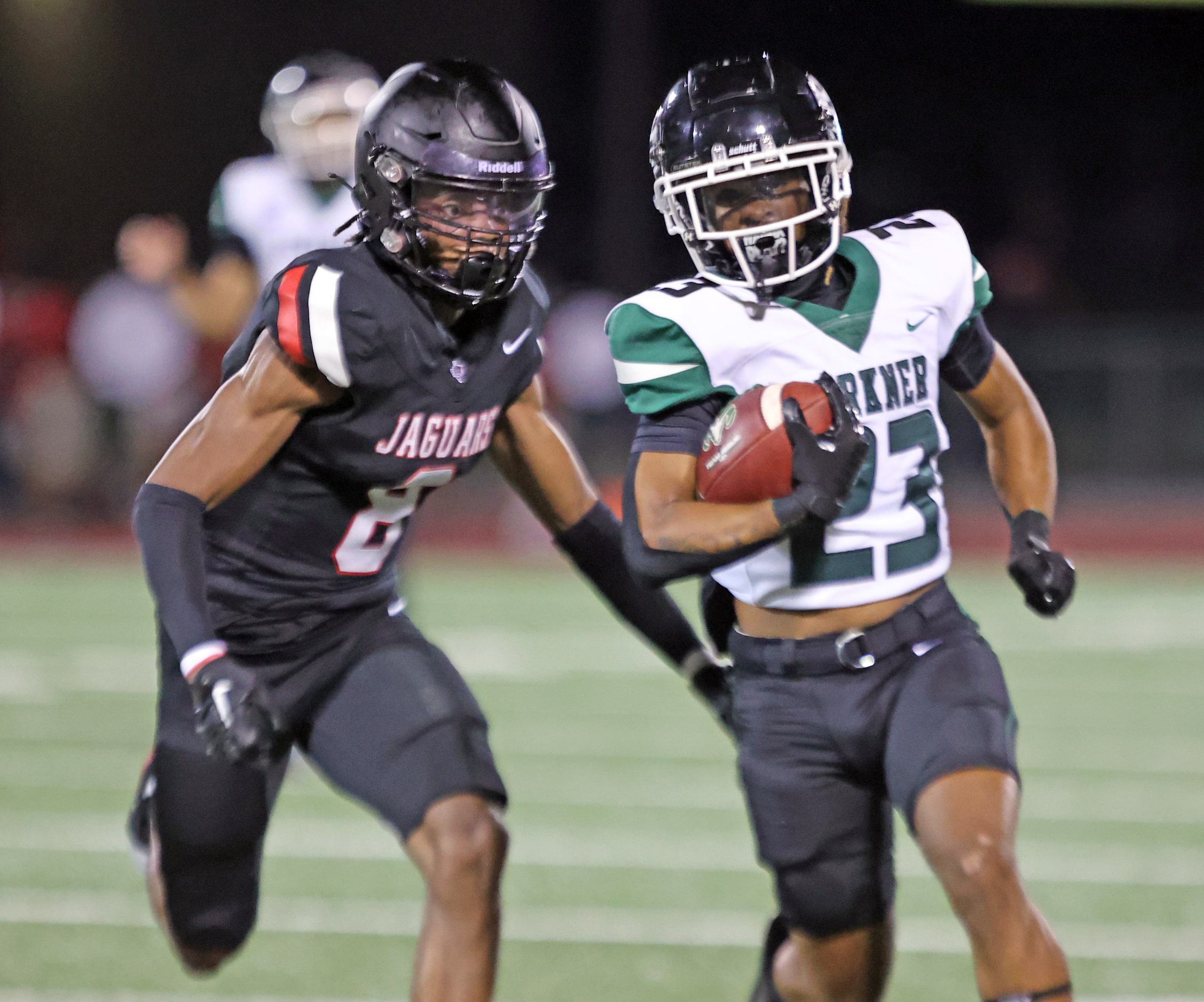 Richrdson Berkner high RB Damonte Nelson (23) picks up a long first down, as Mesquite Horn...