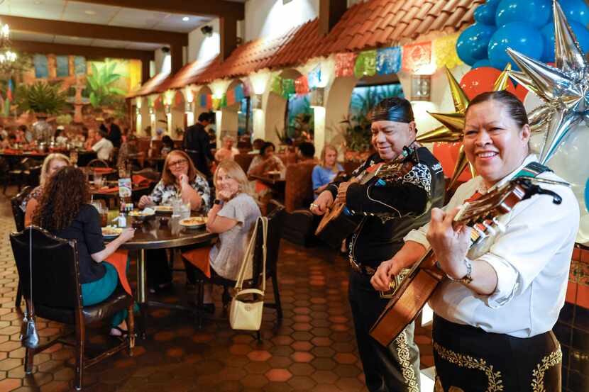 Mariachi performers sing at lunchtime on Sept. 13, 2023, the 105th birthday of El Fenix in...