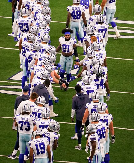 Cowboys running back Ezekiel Elliott takes the field to face the Falcons at AT&T Stadium on...