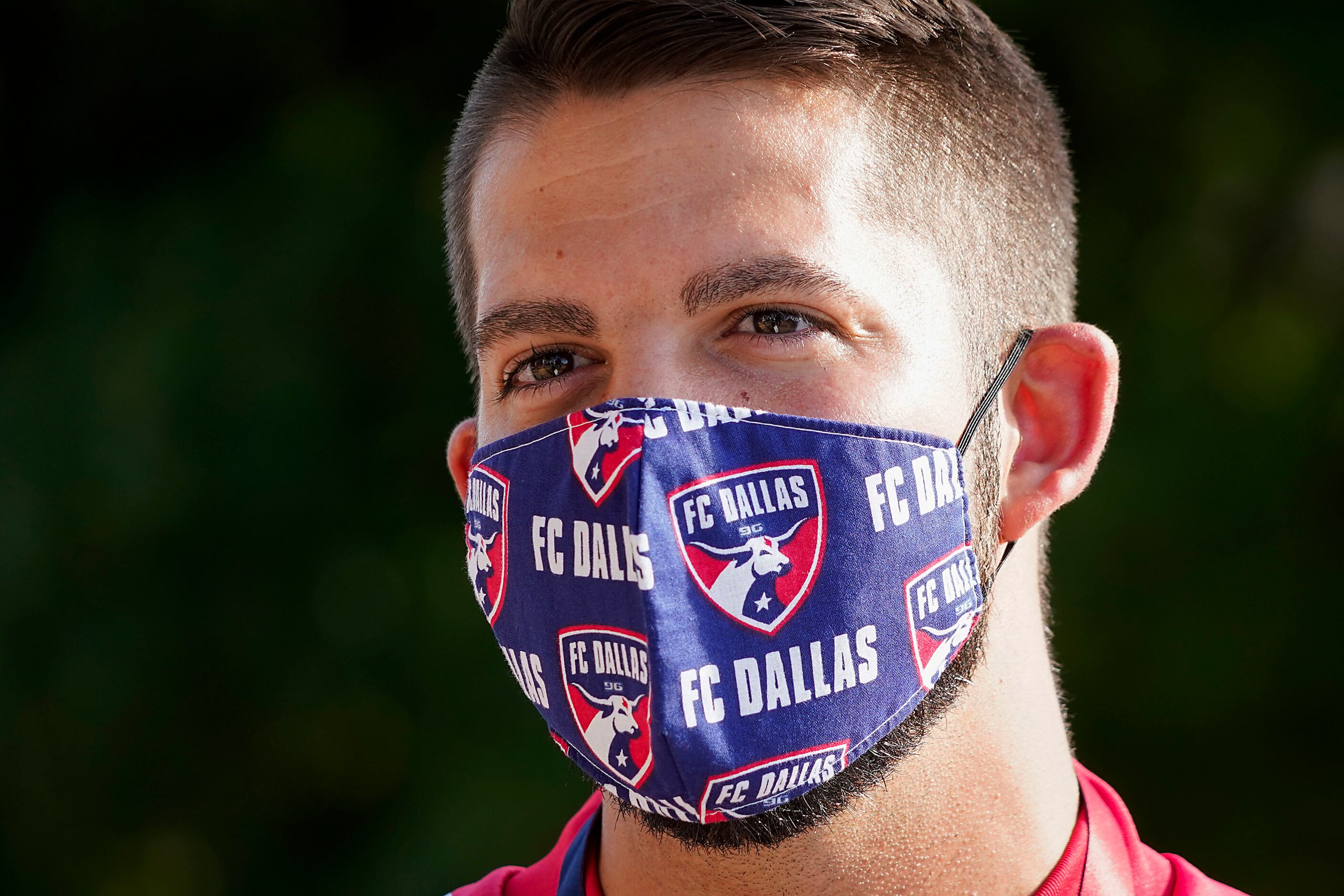 Jeff Files wears a FC Dallas face mask as he waits to enter the West Gate before an MLS...