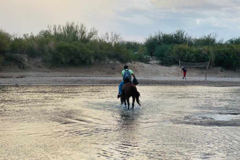 Mexicans ride to the middle of the Rio Grande to deliver crafts to Americans.