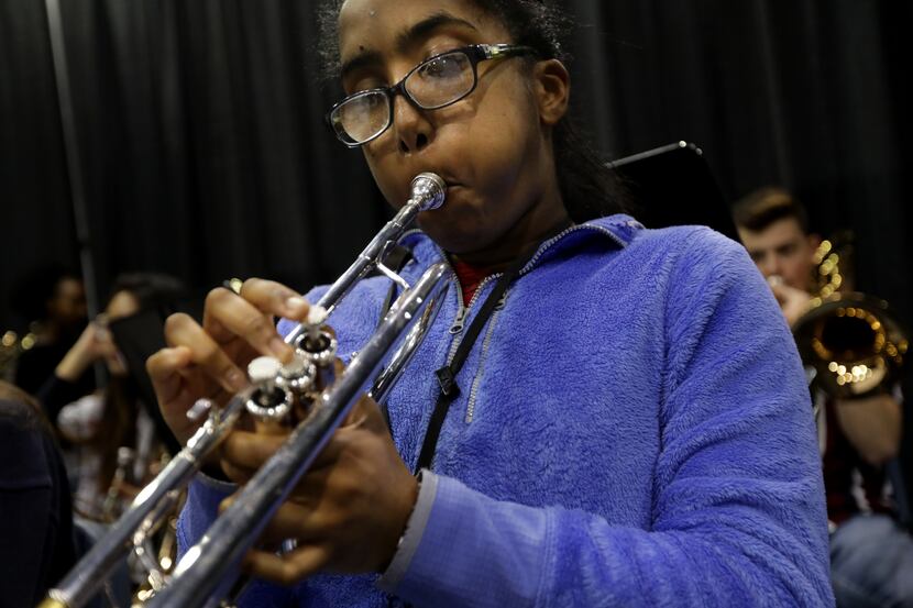 Milka Yohannes practices with the Allen High School band. (Jason Janik/Special Contributor)