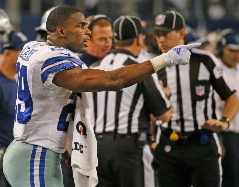 Dallas Cowboys running back DeMarco Murray (29) gestures to a teammate from the sidelines in...