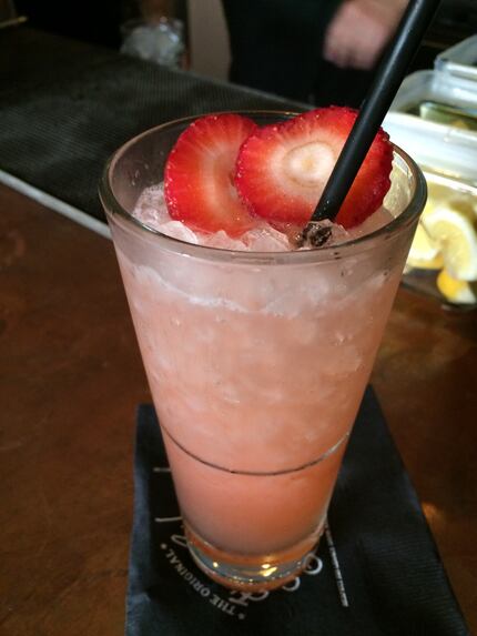 The Shorty, made with Tito's vodka, strawberry puree, lemon, champagne, ginger beer and...