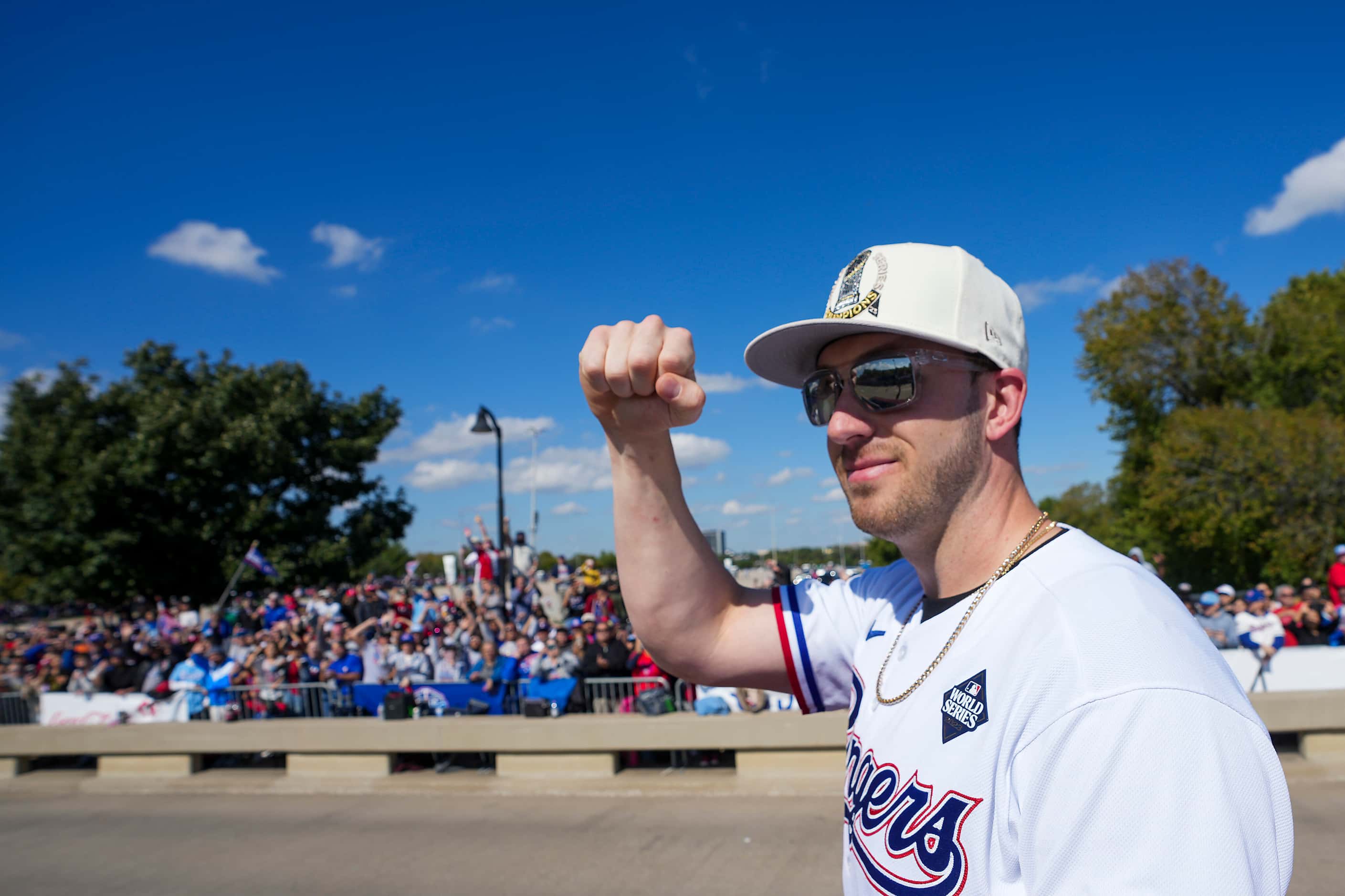 Texas Rangers designated hitter Mitch Garver pumps his fist to the crowd during the Texas...